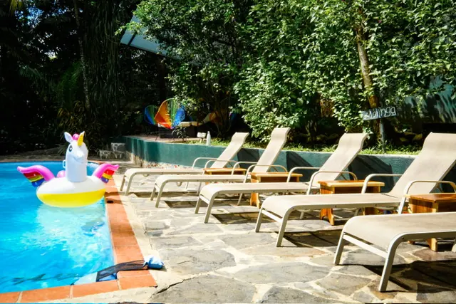 Loungers by the pool at Vida Asana